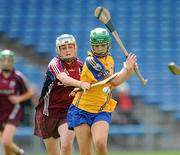 22 August 2010; Katie Cahill, Clare, in action against Laura Donnellan, Galway. All-Ireland Minor A Camogie Championship Final, Galway v Clare, Semple Stadium, Thurles, Co. Tipperary. Picture credit: Matt Browne / SPORTSFILE