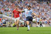 22 August 2010; Bernard Brogan, Dublin, beats Ray Carey, Cork, to score his sides first goal. GAA Football All-Ireland Senior Championship Semi-Final, Dublin v Cork, Croke Park, Dublin. Picture credit: David Maher / SPORTSFILE