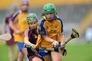 22 August 2010; Katie Cahill, Clare, in action against Tara Kenny, Galway. All-Ireland Minor A Camogie Championship Final, Galway v Clare, Semple Stadium, Thurles, Co. Tipperary. Picture credit: Matt Browne / SPORTSFILE