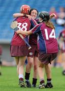 22 August 2010; Ailish O'Reilly, Galway, celebrates after the final whistle with team-mates Niamh McGrath, 38, and Maria Breheny, 14. All-Ireland Minor A Camogie Championship Final, Galway v Clare, Semple Stadium, Thurles, Co. Tipperary. Picture credit: Matt Browne / SPORTSFILE