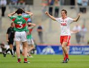 22 August 2010; Ronan O'Neill, Tyrone, celebrates at the end of the game as Niall Freeman, Mayo, holds his head. ESB GAA Football All-Ireland Minor Championship Semi-Final, Mayo v Tyrone, Croke Park, Dublin. Picture credit: David Maher / SPORTSFILE