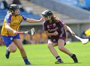 22 August 2010; Maria Breheny, Galway, in action against Maire McGrath, Clare. All-Ireland Minor A Camogie Championship Final, Galway v Clare, Semple Stadium, Thurles, Co. Tipperary. Picture credit: Matt Browne / SPORTSFILE