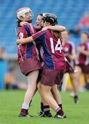 22 August 2010; Ailish O'Reilly, Galway, celebrates after the final whistle with team-mates Niamh McGrath, left, and Maria Breheny, right. All-Ireland Minor A Camogie Championship Final, Galway v Clare, Semple Stadium, Thurles, Co. Tipperary. Picture credit: Matt Browne / SPORTSFILE