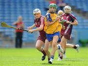 22 August 2010; Katie Cahill, Clare, in action against Laura Donnellan, Galway. All-Ireland Minor A Camogie Championship Final, Galway v Clare, Semple Stadium, Thurles, Co. Tipperary. Picture credit: Matt Browne / SPORTSFILE