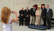21 August 2010; Eight year old Clodagh Gallagher, from Tullamore, photographs from left to right, Monsignor Seán Heaney, Sheamus Howlin, Chairman of the Leinster Council, An Taoiseach Brian Cowen T.D., Molly Buckley, Chairperson of Tullamore Urban District Council, Uachtarán Chumann Lúthchleas Gael Criostóir Ó Cuana and Pat Teehan, Chairman of the Offaly County Board at the official opening of O'Connor Park, Tullamore, Co. Offaly. Picture credit: Ray McManus / SPORTSFILE