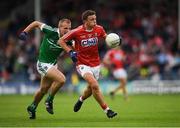 9 July 2016; Mark Collins of Cork in action against Sean O Dea of Limerick during the GAA Football All-Ireland Senior Championship Round 2A match between Limerick and Cork at Semple Stadium in Thurles, Tipperary. Photo by Stephen McCarthy/Sportsfile