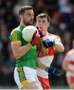 9 July 2016; Mickey Newman of Meath in action against Gareth McKinless of Derry during the GAA Football All-Ireland Senior Championship - Round 2A match between Derry and Meath at Derry GAA Centre of Excellence in Owenbeg, Derry. Photo by Oliver McVeigh/Sportsfile