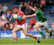 9 July 2016; Peter Kelleher of Cork in action against Stephen Cahill of Limerick during the GAA Football All-Ireland Senior Championship Round 2A match between Limerick and Cork at Semple Stadium in Thurles, Tipperary. Photo by Stephen McCarthy/Sportsfile
