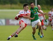 9 July 2016; Danny Heavron of Derry in action against Graham Reilly of Meath during the GAA Football All-Ireland Senior Championship - Round 2A match between Derry and Meath at Derry GAA Centre of Excellence in Owenbeg, Derry. Photo by Oliver McVeigh/Sportsfile