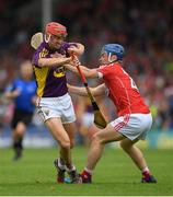 9 July 2016; Paul Morris of Wexford in action against Conor O'Sullivan of Cork during the GAA Hurling All-Ireland Senior Championship Round 2 match between Cork and Wexford at Semple Stadium in Thurles, Tipperary. Photo by Stephen McCarthy/Sportsfile