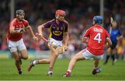 9 July 2016; Paul Morris of Wexford in action against Christopher Joyce, left, and Conor O'Sullivan of Cork during the GAA Hurling All-Ireland Senior Championship Round 2 match between Cork and Wexford at Semple Stadium in Thurles, Tipperary. Photo by Stephen McCarthy/Sportsfile