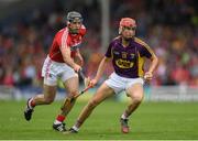 9 July 2016; Paul Morris of Wexford in action against Christopher Joyce of Cork during the GAA Hurling All-Ireland Senior Championship Round 2 match between Cork and Wexford at Semple Stadium in Thurles, Tipperary. Photo by Stephen McCarthy/Sportsfile