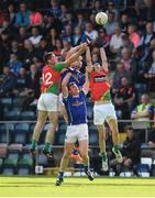 9 July 2016; Martin Reilly and Killian Clarke of Cavan in action against Hughie Gahan and Sean Gannon of Carlow during the GAA Football All-Ireland Senior Championship - Round 2A match between Cavan and Carlow at Kingspan Breffni Park in Cavan. Photo by Matt Browne/Sportsfile