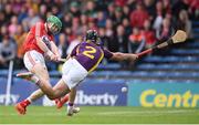 9 July 2016; Daniel Kearney of Cork shoots to score his side's first goal despite the tackle of of Eoin Moore of Wexford during the GAA Hurling All-Ireland Senior Championship Round 2 match between Cork and Wexford at Semple Stadium in Thurles, Tipperary. Photo by Stephen McCarthy/Sportsfile