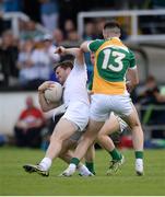 9 July 2016; Niall Kelly of Kildare in action against Graham Guilfoyle and Niall Darby of Offaly, behind, during the GAA Football All-Ireland Senior Championship - Round 2B match between Kildare and Offaly at St Conleth's Park in Newbridge, Kildare. Photo by Piaras Ó Mídheach/Sportsfile