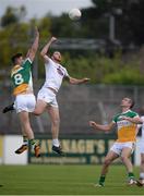 9 July 2016; Johnny Byrne of Kildare in action against Eoin Carroll of Offaly, supported by team-mate Niall Smith, right, during the GAA Football All-Ireland Senior Championship - Round 2B match between Kildare and Offaly at St Conleth's Park in Newbridge, Kildare.  Photo by Piaras Ó Mídheach/Sportsfile