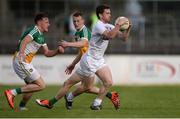 9 July 2016; Niall Kelly of Kildare in action against Graham Guilfoyle, left, and Peter Cunningham of Offaly during the GAA Football All-Ireland Senior Championship - Round 2B match between Kildare and Offaly at St Conleth's Park in Newbridge, Kildare. Photo by Piaras Ó Mídheach/Sportsfile