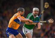 9 July 2016; Tom Condon of Limerick in action against John Conlon of Clare during the GAA Hurling All-Ireland Senior Championship Round 2 match between Clare and Limerick at Semple Stadium in Thurles, Tipperary. Photo by Stephen McCarthy/Sportsfile