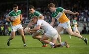 9 July 2016; Tommy Moolick of Kildare in action against Offaly's, from left, Eoin Carroll, Niall McNamee and Johnny Moloney during the GAA Football All-Ireland Senior Championship - Round 2B match between Kildare and Offaly at St Conleth's Park in Newbridge, Kildare.  Photo by Piaras Ó Mídheach/Sportsfile