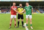 9 July 2016; Paul Kerrigan of Cork and Iain Corbett of Limerick with referee Noel Mooney before the GAA Football All Ireland Senior Championship Round 2A match between Limerick and Cork at Semple Stadium in Thurles, Tipperary. Photo by Eóin Noonan/Sportsfile