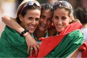 10 July 2016; Sara Moreira, centre, of Portugal celebrates winning gold in the Women's Half Marathon with team-mates Dulce Félix, left, who finished 12th and Jessica Augusto, who won the bronze medal, on day five of the 23rd European Athletics Championships at the Olympic Stadium in Amsterdam, Netherlands. Photo by Brendan Moran/Sportsfile