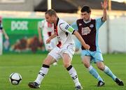 23 August 2010; Glenn Cronin, Bohemians, in action against Mick Daly, Drogheda United. Airtricity League Premier Division, Drogheda United v Bohemians, United Park, Drogheda, Co. Louth. Picture credit: Oliver McVeigh / SPORTSFILE