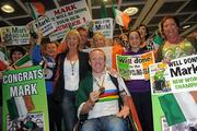 24 August 2010; Mark Rohan, from Athlone, Co. Westmeath, with his mother Carmel and family and friends on his return home after securing Ireland's first ever Paracycling World Championship Gold Medal by winning the H1 Handcycling Road Race in Baie-Comeau Canada. Dublin Airport, Dublin. Picture credit: Brian Lawless / SPORTSFILE