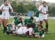 24 August 2010; Tania Rosser, Ireland, scores her side's fourth try. 2010 Women's Rugby World Cup - Pool B, Ireland v USA, Surrey Sports Park, Guildford, England. Picture credit: Matt Impey / SPORTSFILE
