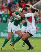 24 August 2010: Joy Neville, Ireland, in action against Rachel Reddick, USA. 2010 Women's Rugby World Cup - Pool B, Ireland v USA, Surrey Sports Park, Guildford, England. Picture credit: Matt Impey / SPORTSFILE