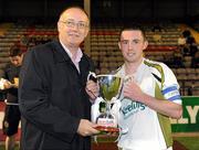 24 August 2010; Phillip Hand, Sporting Fingal A, receives the cup from Fran Gavin of the FAI. Newstalk Cup Final, Bohemians A v Sporting Fingal A, Dalymount Park, Dublin. Picture credit: Barry Cregg / SPORTSFILE