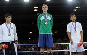 25 August 2010; Gold medalist, Ireland's Ryan Burnett, Holy Family Boxing Club, Belfast, centre, with Silver medalist Alizada Salman of Azerbaijan, and bronze medalist Hoorboyev Zohidjon of Uzbekistan, right, stand on the podium after the presentation in the Light Fly weight, 48kg, category. Burnett defeated Salman Alizida, of Azerbaijan, 13-6, in the Final. 2010 Youth Olympic Games, International Convention Centre, Singapore.