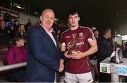 10 July 2016; Pictured is Kevin Molloy, Customer Relationship Manager of Electric Ireland, proud sponsor of the GAA All-Ireland Minor Championships, presenting X from Evan Murphy of Galway with the Player of the Match award for his outstanding performance in the Electric Ireland Connacht Minor Football Championship Final in Pearse Stadium in Galway.Throughout the Championship fans can follow the conversation, support the Minors and be a part of something major through the hashtag #GAAThisIsMajor. Photo by Ramsey Cardy/Sportsfile