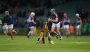 10 July 2016; Tipperary players warm against a background of hurleys before the Electric Ireland Munster GAA Minor Hurling Championship Final match between Limerick and Tipperary at the Gaelic Grounds in Limerick Photo by Ray McManus/Sportsfile