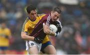 10 July 2016; Danny Cummins of Galway is tackled by David Murray of Roscommon during the Connacht GAA Football Senior Championship Final between Roscommon and Galway at Pearse Stadium in Galway. Photo by Ramsey Cardy/Sportsfile