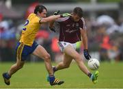 10 July 2016; Paul Conroy of Galway is tackled by David Keenan of Roscommon during the Connacht GAA Football Senior Championship Final between Roscommon and Galway at Pearse Stadium in Galway. Photo by Ramsey Cardy/Sportsfile