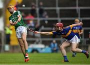 10 July 2016; Brian Ryan of Limerick  in action against Cian Flanagan of Tipperary during the Electric Ireland Munster GAA Minor Hurling Championship Final match between Limerick and Tipperary at the Gaelic Grounds in Limerick. Photo by Eóin Noonan/Sportsfile