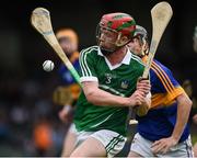 10 July 2016; Conor Nicholas of Limerick in action against Dylan Walsh of Tipperary during the Electric Ireland Munster GAA Minor Hurling Championship Final match between Limerick and Tipperary at the Gaelic Grounds in Limerick Photo by Ray McManus/Sportsfile