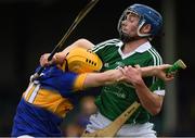 10 July 2016; Mark Kehoe of Tipperary in action against Brian Timmons of Limerick during the Electric Ireland Munster GAA Minor Hurling Championship Final match between Limerick and Tipperary at the Gaelic Grounds in Limerick Photo by Ray McManus/Sportsfile