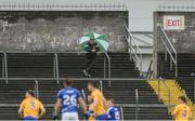 10 July 2016; A lone spectator looks on during the GAA Football All-Ireland Senior Championship - Round 2A match between Clare and Laois at Cusack Park in Ennis, Clare. Photo by Piaras Ó Mídheach/Sportsfile
