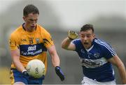 10 July 2016; Eoin Cleary of Clare in action against Kieran Lillis of Laois during the GAA Football All-Ireland Senior Championship - Round 2A match between Clare and Laois at Cusack Park in Ennis, Clare. Photo by Piaras Ó Mídheach/Sportsfile