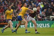 10 July 2016; Niall Daly of Roscommon in action against Johnny Heaney of Galway during the Connacht GAA Football Senior Championship Final between Roscommon and Galway at Pearse Stadium in Galway. Photo by Sportsfile
