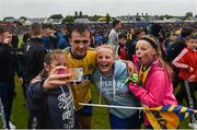 10 July 2016; Donie Smith of Roscommon, who scored his side's equalizing free, poses for selfies with fans following the Connacht GAA Football Senior Championship Final between Roscommon and Galway at Pearse Stadium in Galway. Photo by Sportsfile