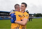 10 July 2016; Jamie Malone, behind, and Enda Coughlan of Clare celebrate after the GAA Football All-Ireland Senior Championship - Round 2A match between Clare and Laois at Cusack Park in Ennis, Clare. Photo by Piaras Ó Mídheach/Sportsfile