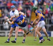 10 July 2016; Austin Gleeson of Waterford in action against Michael Breen of Tipperary during the Munster GAA Hurling Senior Championship Final match between Tipperary and Waterford at the Gaelic Grounds in Limerick.  Photo by Stephen McCarthy/Sportsfile