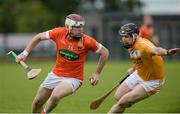 10 July 16; Eoin McGuinness of Armagh in action against Neal McAuley of Antrim during the Ulster GAA Hurling Senior Championship Final match between Antrim and Armagh at Derry GAA Centre of Excellence in Owenbeg, Derry. Photo by Oliver McVeigh/Sportsfile