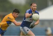 10 July 2016; Paul Cahillane of Laois in action against Cian O'Dea of Clare during the GAA Football All-Ireland Senior Championship - Round 2A match between Clare and Laois at Cusack Park in Ennis, Clare. Photo by Piaras Ó Mídheach/Sportsfile