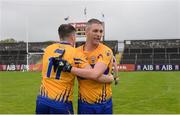 10 July 2016; Enda Coughlan, right, and Keelan Sexton of Clare celebrate after the GAA Football All-Ireland Senior Championship - Round 2A match between Clare and Laois at Cusack Park in Ennis, Clare. Photo by Piaras Ó Mídheach/Sportsfile