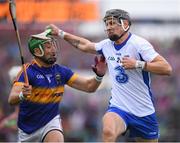 10 July 2016; Maurice Shanahan of Waterford in action against James Barry of Tipperary during the Munster GAA Hurling Senior Championship Final match between Tipperary and Waterford at the Gaelic Grounds in Limerick.  Photo by Stephen McCarthy/Sportsfile