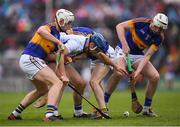 10 July 2016; Michael Walsh of Waterford in action against Tipperary players, from left, Ronan Maher, Michael Cahill and Seamus Kennedy during the Munster GAA Hurling Senior Championship Final match between Tipperary and Waterford at the Gaelic Grounds in Limerick.  Photo by Stephen McCarthy/Sportsfile