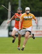 10 July 16; Conor Carson of Antrim in action against David Carvill of Armagh during the Ulster GAA Hurling Senior Championship Final match between Antrim and Armagh at Derry GAA Centre of Excellence in Owenbeg, Derry. Photo by Oliver McVeigh/Sportsfile